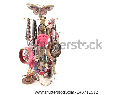 Selection of women\'s jewellery hanging on a display rack