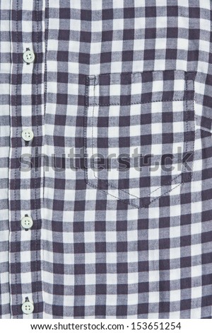 Front of a gingham blouse showing pockets,collar and buttons