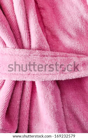 Close up of the tie belt on a pink dressing gown