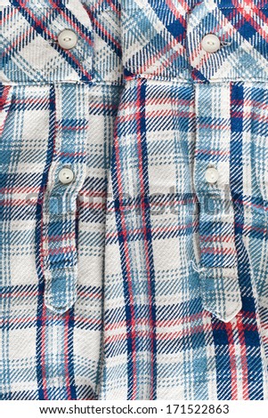 Tartan patterned shirt sleeves with close up details