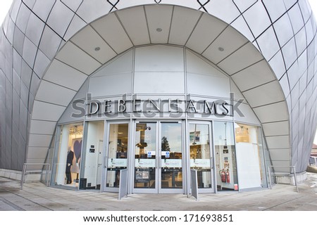 BURY ST EDMUNDS, UK - JANUARY 12, 2014: The main doors of the Debenhams department store in the Arc shopping complex.