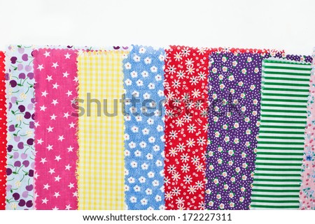 Selection of vibrant fabric samples as a background