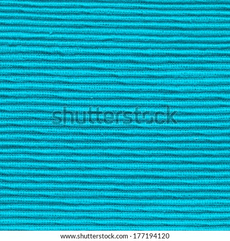 Macro of turquoise color material as a background
