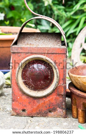 A rusty antique lantern at a second hand market