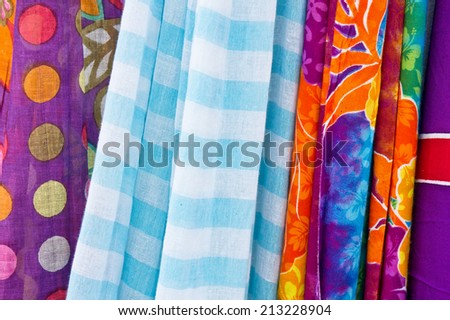 Set of multi-colored cloths hanging, as a background image