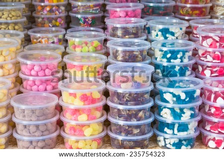 Tubs of sweets at a market stall