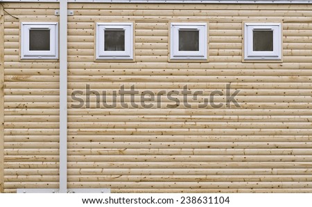 New wooden building with pvc windows