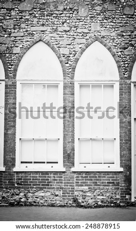 Pair of arched windows in an old building