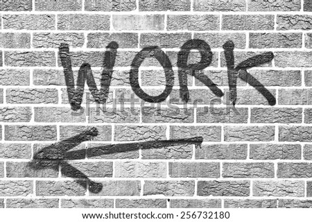 Work painted on brick wall  in black and white