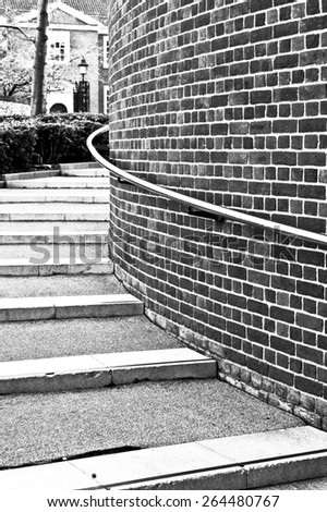 Modern stone steps in a UK town in black and white