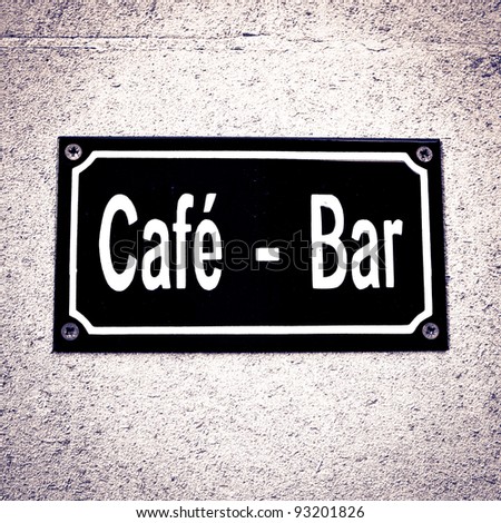 Sign for a cafe-bar with dramatic lighting and contrast