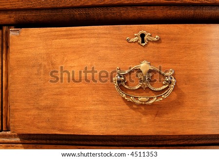 antique dresser drawer with brass handle