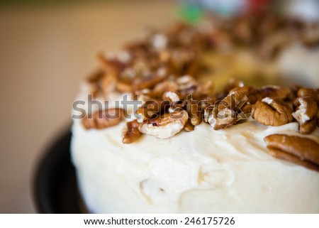 delicious cake with nuts and chocolates on