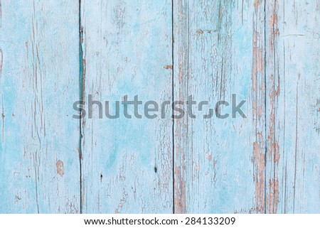 Old wood texture from an old wooden door on an old abandoned building, to be used for backgrounds or textures