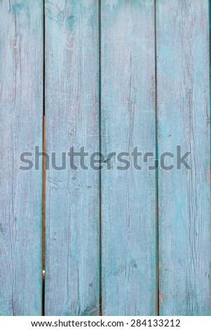 Old wood texture from an old wooden door on an old abandoned building, to be used for backgrounds or textures