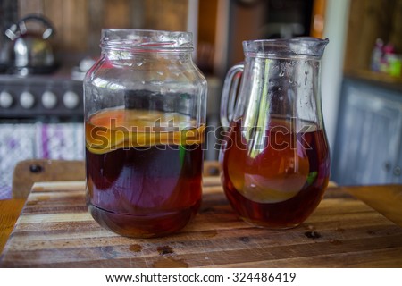 Step by Step how to make Kombucha tea, the brew is ready to be placed in storage with the bacteria culture in place to ferment the brew.