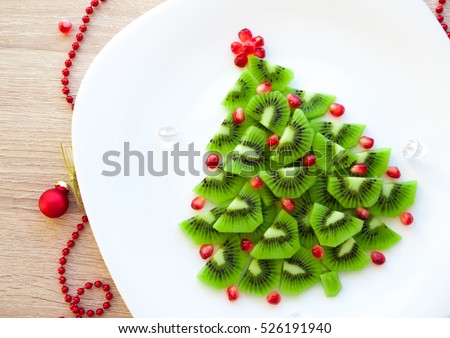 Kiwi Christmas tree - fun food idea for kids party or breakfast, New Year food background