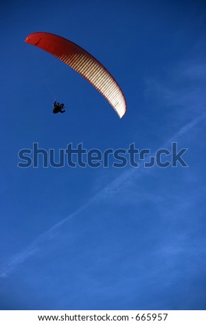 Parachute in blue sky