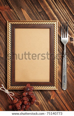 Menu frame on the wooden board