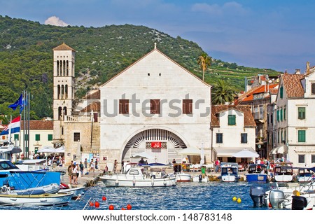 European Southern City Scape. Sea, Bay, Boat, Mountain, Houses, Blue Sky, Resort & Holiday. Hvar. Croatia.