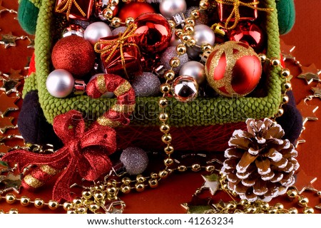 Colorful christmas basket full of decorations