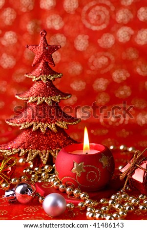 Shinny christmas postcard with burning candle, christmas tree, and shinny decorations