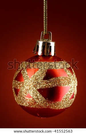 Christmas red globe with sparkle golden decoration