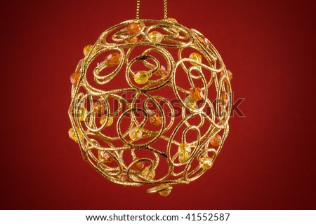 Vintage christmas globe made from gold and decorated with fine jewels