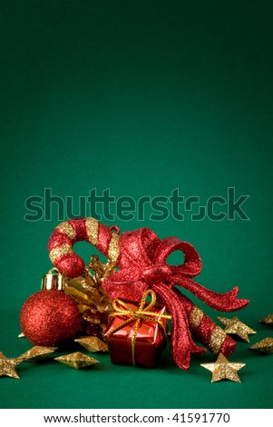 Red christmas candy, red globe and gift box, golden stars
