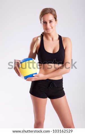 Young woman in great shape - fitness concept