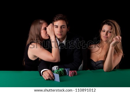 Young handsome man playing texas hold\'em poker