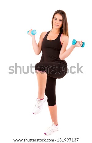 Young woman in great shape - fitness concept
