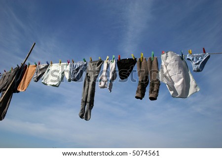 Old Clothes Drying in a Beautiful Background Blue Sky