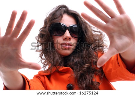 Beautiful woman with sunglasses, posing over white background