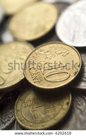pile of coins (ten euro cents on the top) - shallow DOF