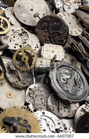 a bundle of grunge watch and clock pieces - focus in the back