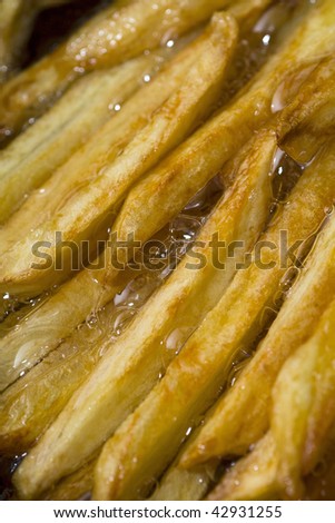french fries in boiling oil