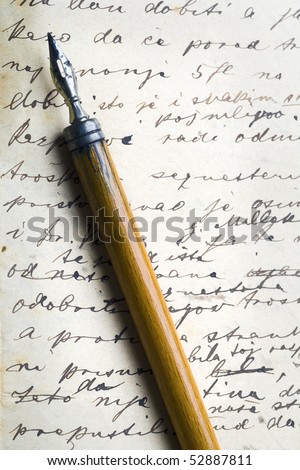 a vintage pen on a handwritten grunge paper