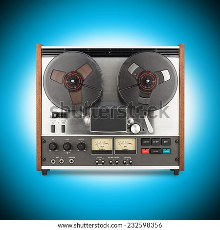 retro tape recorder in front of blue background