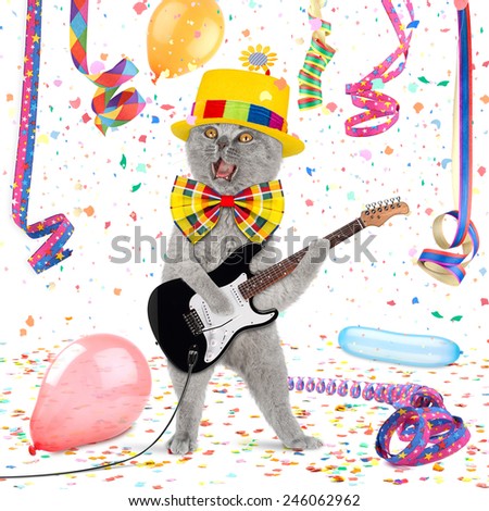 Cat with guitar in middle of confetti and streamer