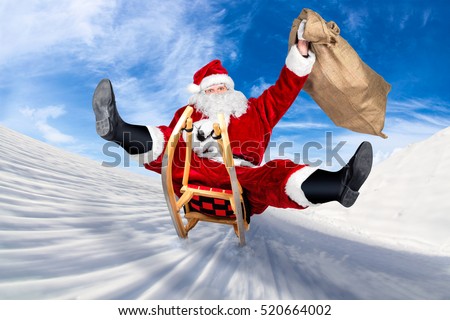 crazy santa claus on his sleigh hilarious fast funny crazy xmas christmas gift present delivery blue sky background