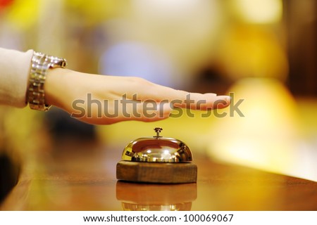 business woman  at the reception of a hotel checking in