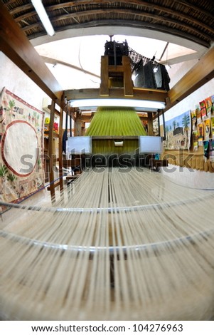old wooden machine for produce traditional arabic rug