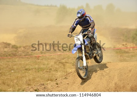 motocross bike in a race representing concept of speed and power in extreme man sport