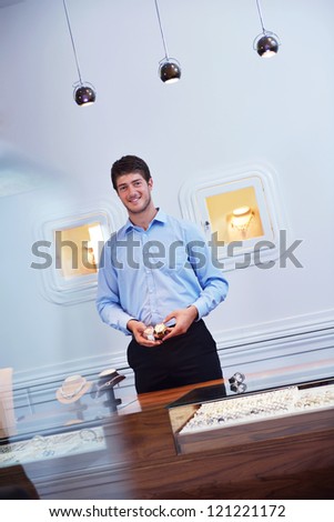 business man selling in jewelry store