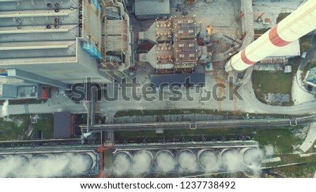 Aerial top view of power plant electrical industry factory abstract background top view pollution concept