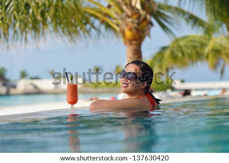 beautifu and happy woman girl on beach have fun and relax on summer vacation  over the sea