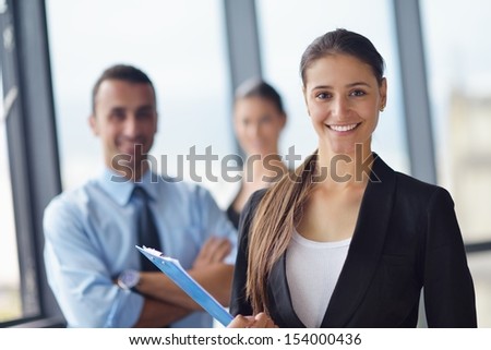 Group of happy young business people in a meeting at office Group of happy young business people in a meeting at office