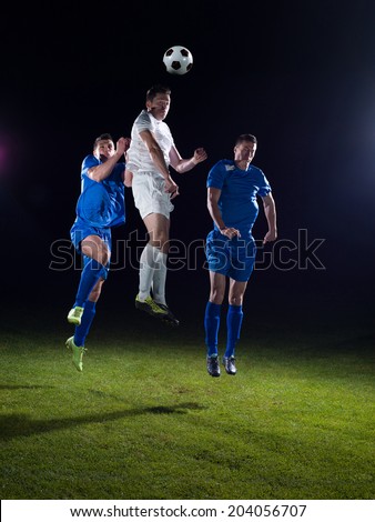 soccer football team  player game duel isolated on black background