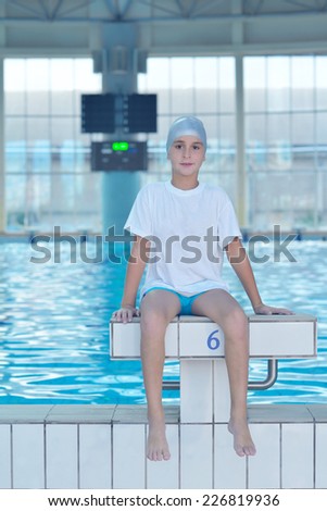 health and fitness lifestyle concept with young athlete swimmer recreating  on indoor olympic pool